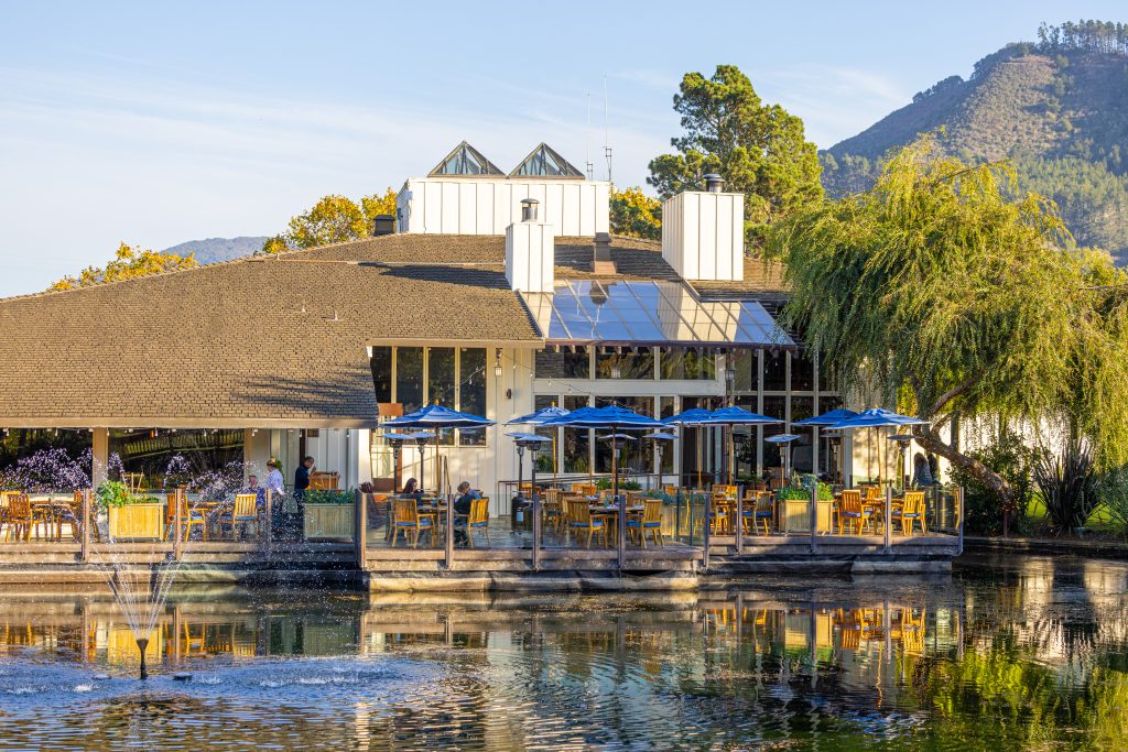The Covey Grill terrace overlooks water features and the greens